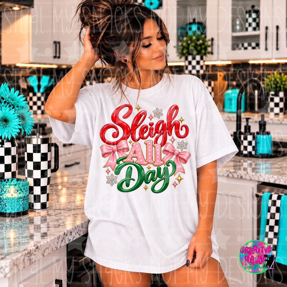 Red, pink and green Sleigh All Day lettering with pink bows and snowflakes. Shirt preview.