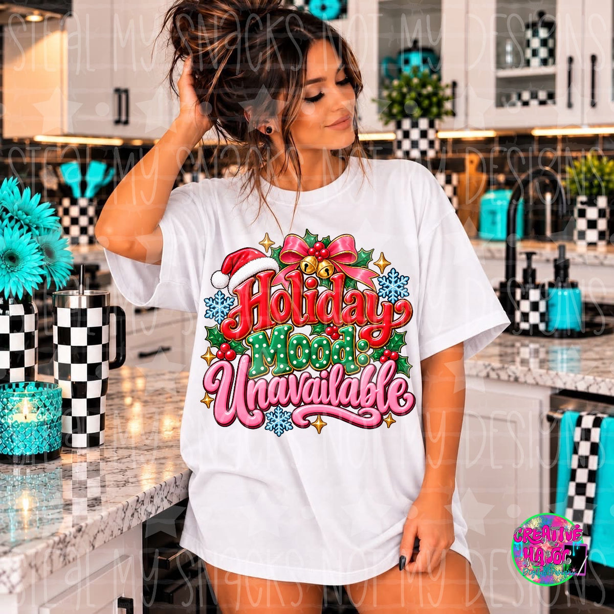 Red, green and pink lettering with bells, a Santa hat and holiday accents. Shirt preview.